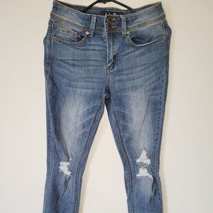 Indigo Rein ripped knees. Skinny